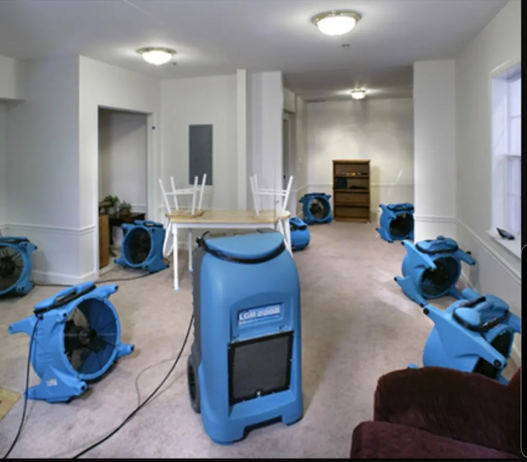Air movers and dehumidifier setup for Water Damage Restoration in Bartlett